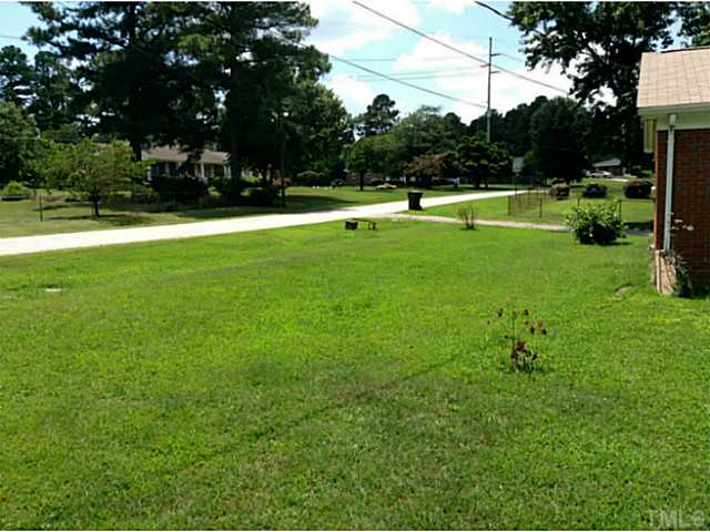 2405 Trawick Road Raleigh, NC 27604 - Photo 20 of 20 a view of building with trees in the background