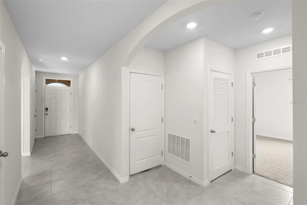 336 Camilla Road DeLand, FL 32724 - Photo 12 of 38 a view of a hallway with closet area
