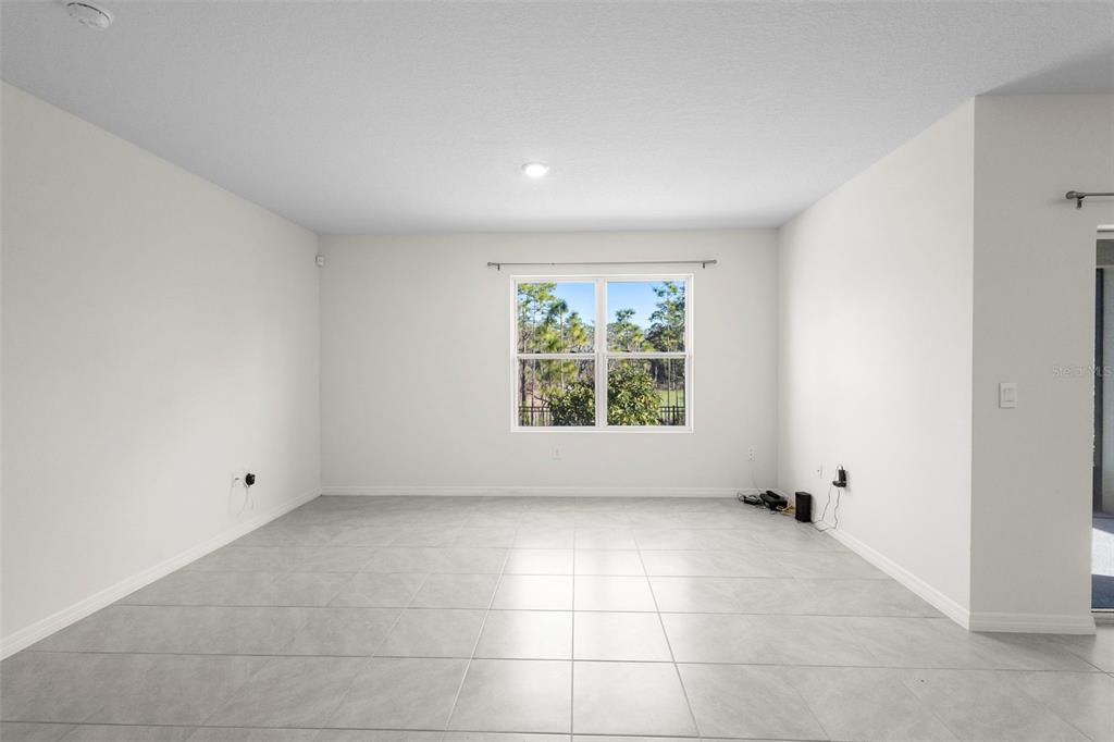 336 Camilla Road DeLand, FL 32724 - Photo 23 of 38 a view of an empty room with a window