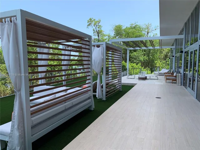 a view of outdoor space with seating area