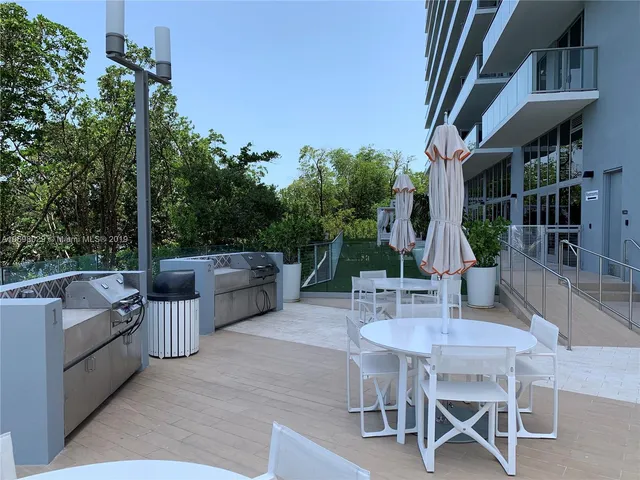 a view of lake with green space