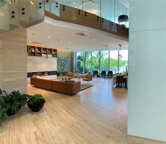 a view of a street with palm trees