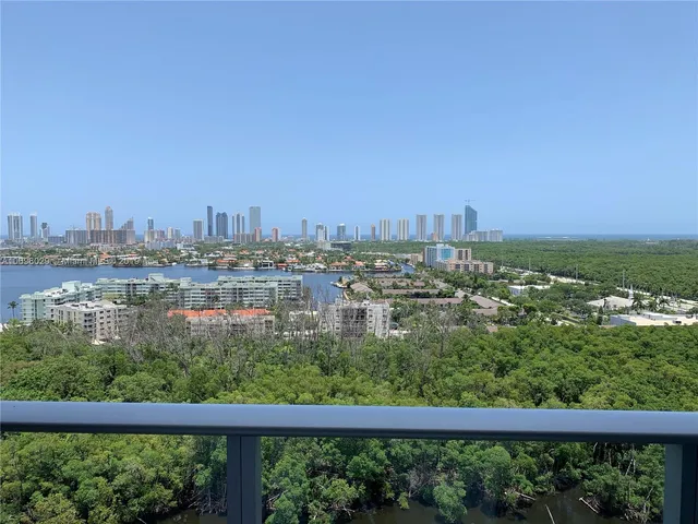 a view of a city skyline from a balcony