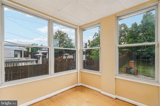 a view of a room with a large window