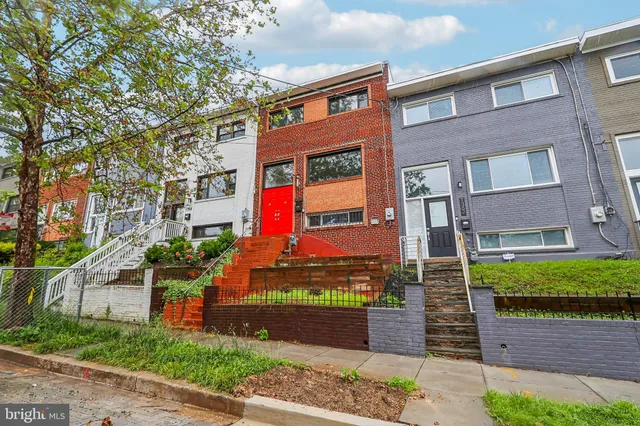 a front view of a building with street