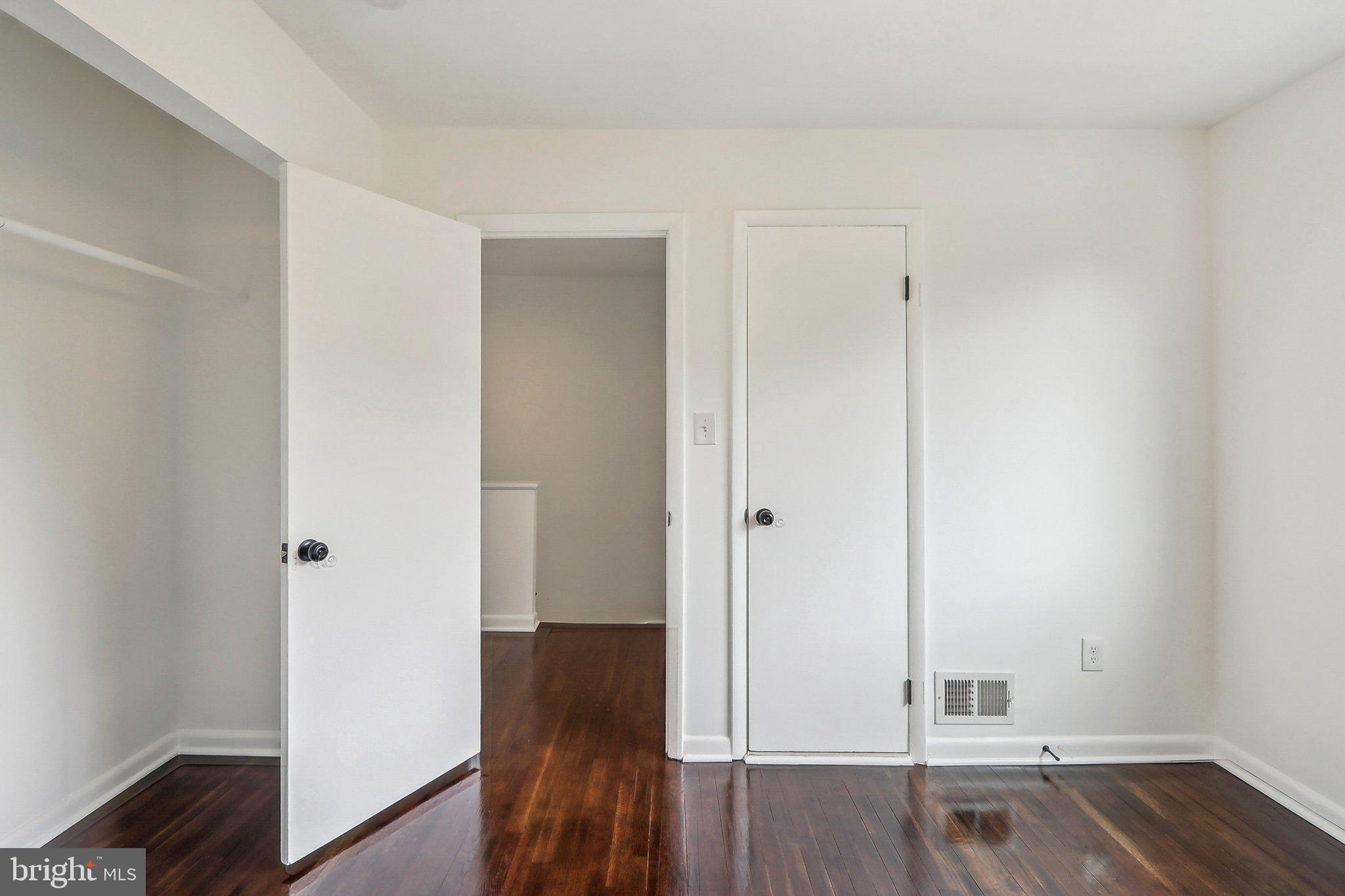 1360 W Street Northeast Washington, DC 20018 - Photo 32 of 48 a view of a hallway with wooden floor