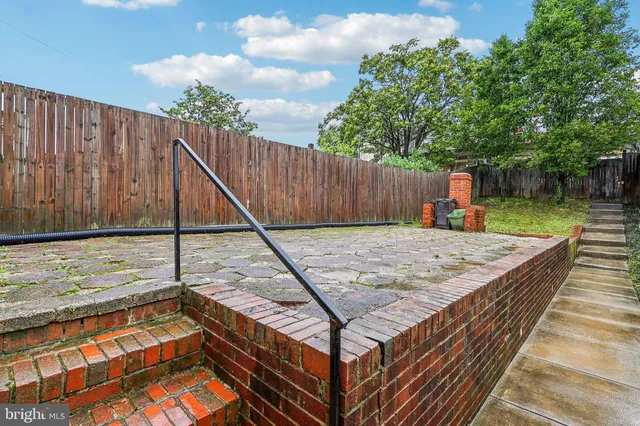 a view of a wooden fence