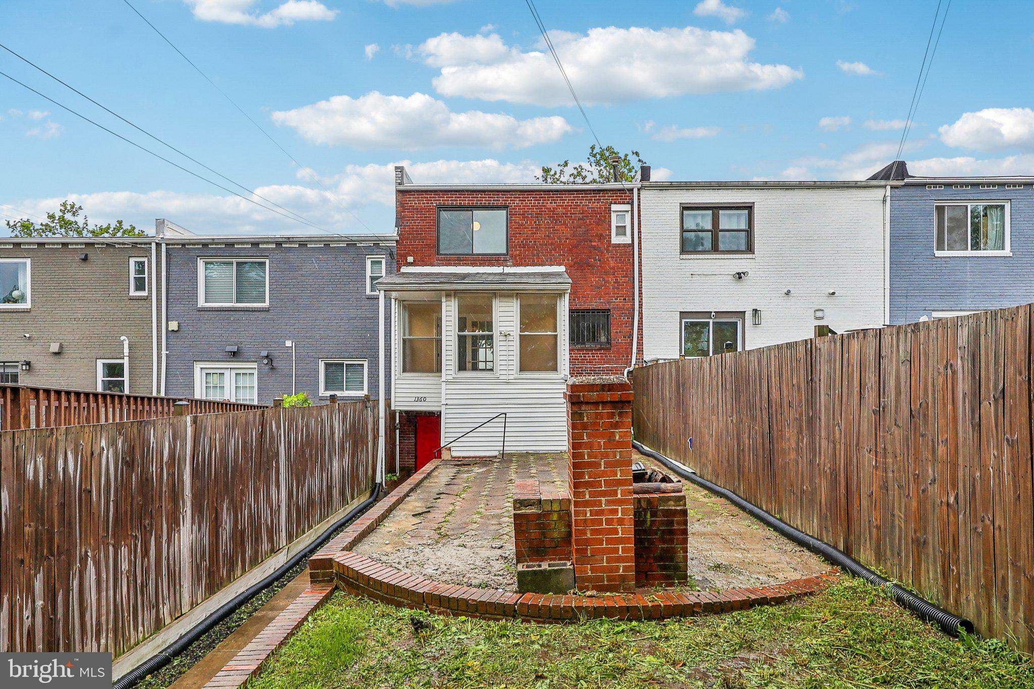 1360 W Street Northeast Washington, DC 20018 - Photo 45 of 48 a view of a house with wooden fence