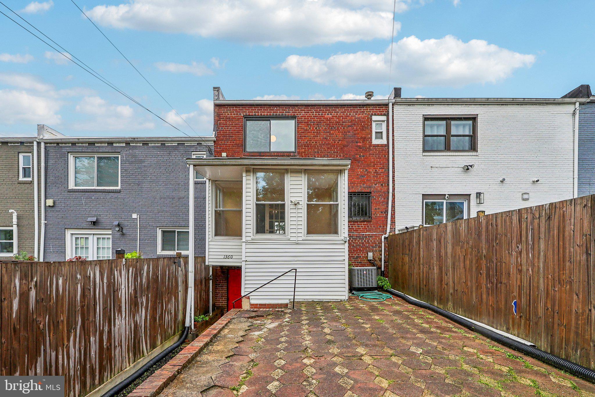 1360 W Street Northeast Washington, DC 20018 - Photo 46 of 48 a view of a house with wooden fence