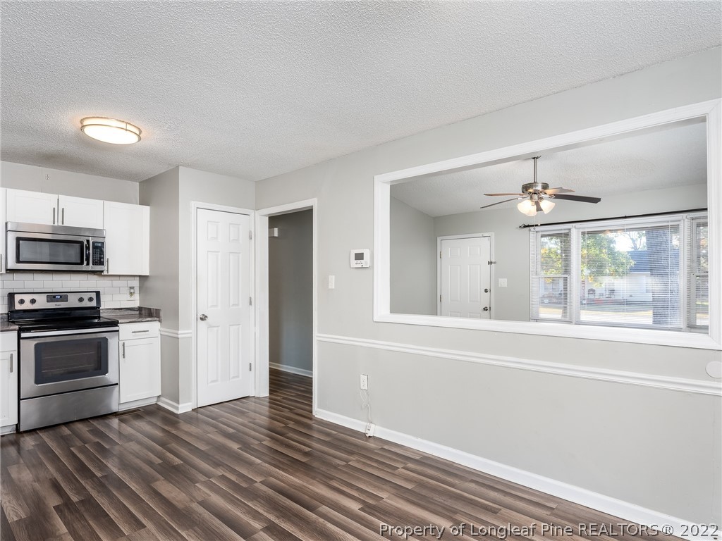921 Hollydale Lane Fayetteville, NC 28314 - Photo 12 of 32 a view of a kitchen from the hallway