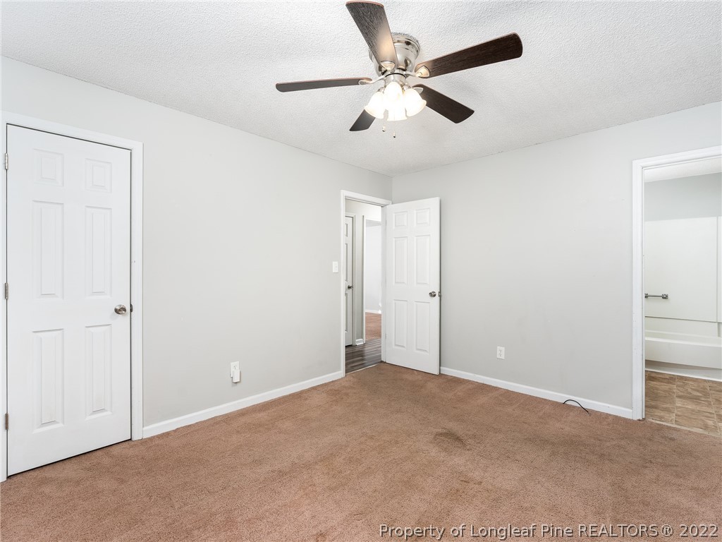 921 Hollydale Lane Fayetteville, NC 28314 - Photo 20 of 32 an empty room with fan