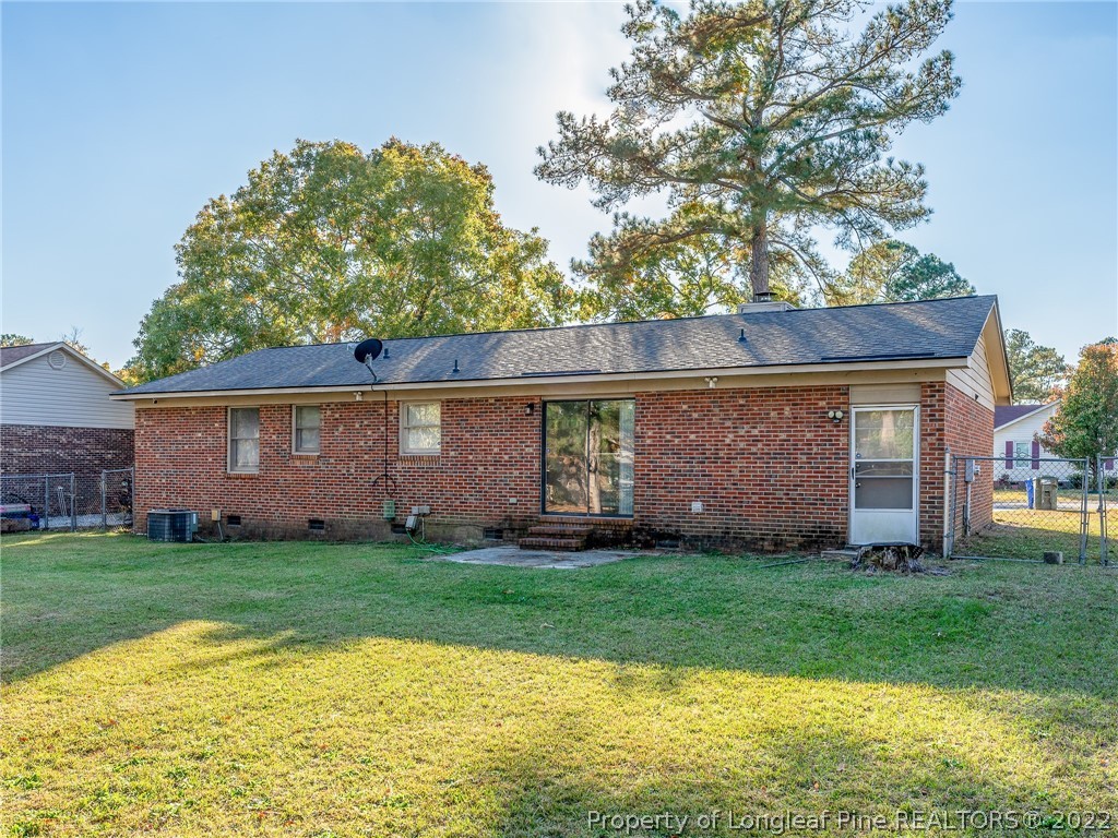 921 Hollydale Lane Fayetteville, NC 28314 - Photo 27 of 32 a view of a house with a yard