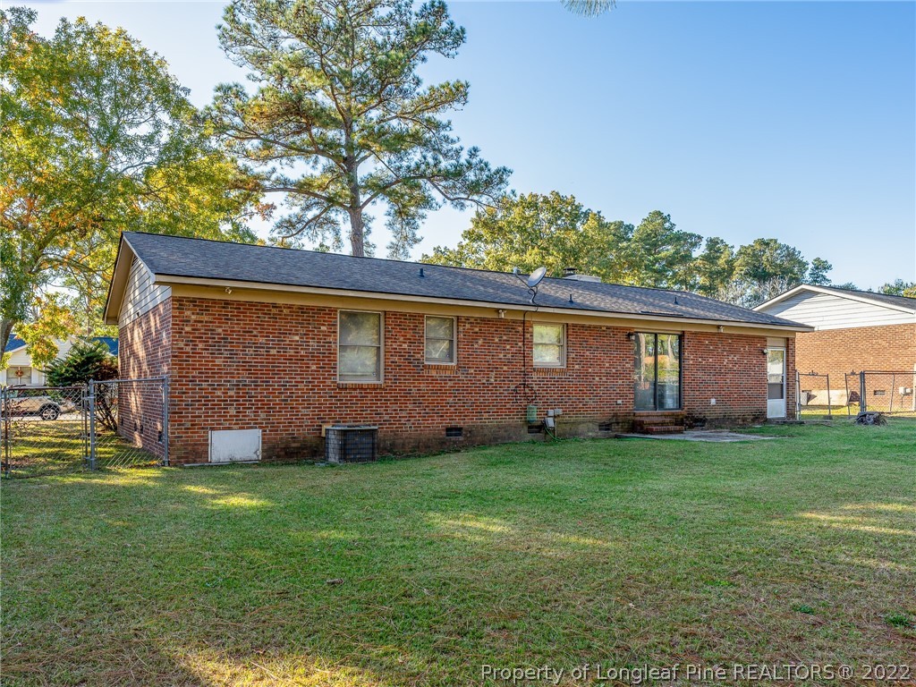 921 Hollydale Lane Fayetteville, NC 28314 - Photo 29 of 32 a view of a house with a yard