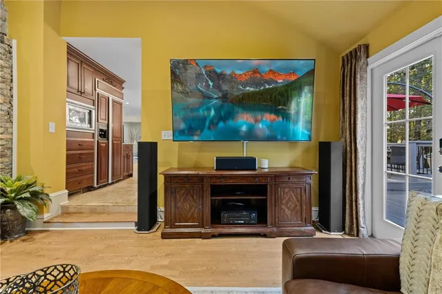 a view of staircase with wooden floor and a potted plant