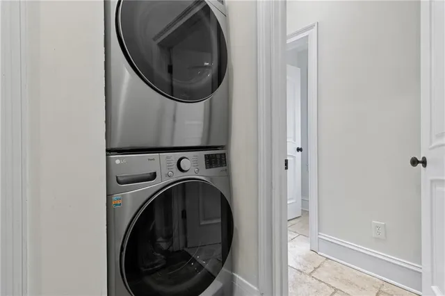 an outdoor space with furniture and umbrella