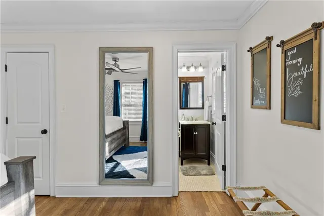 a living room with furniture chess table and a window