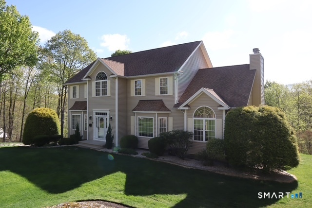 51 Brookfield Road Seymour, CT 06483 - Photo 1 of 37 a front view of a house with a garden