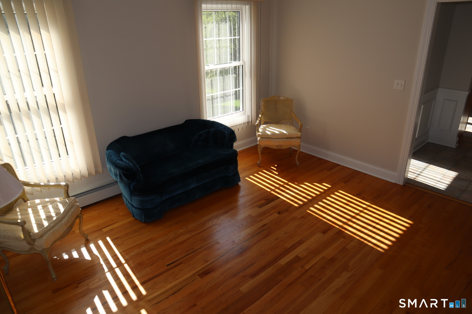 51 Brookfield Road Seymour, CT 06483 - Photo 15 of 37 a living room with a couch and a window