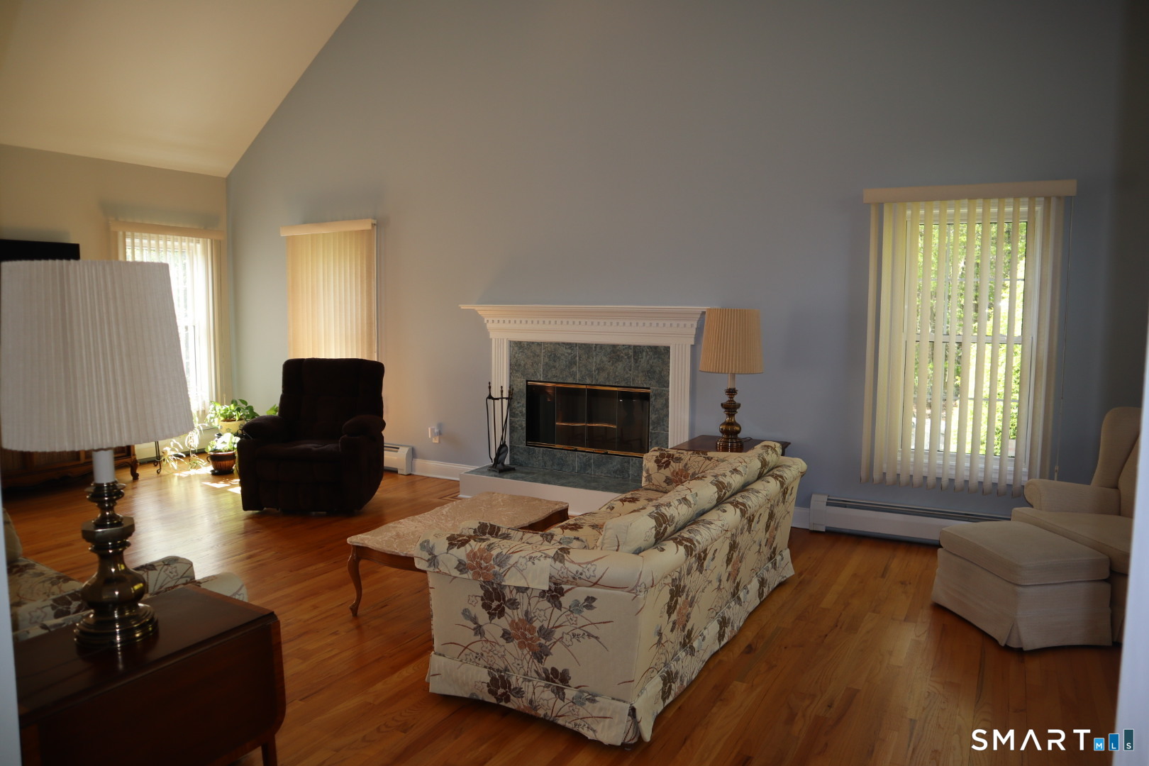 51 Brookfield Road Seymour, CT 06483 - Photo 19 of 37 a living room with furniture and a fireplace