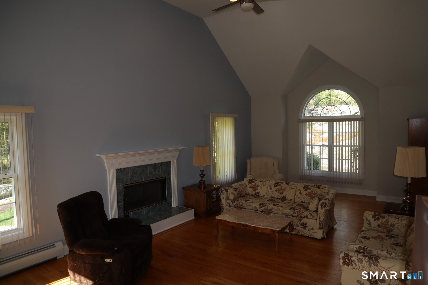 51 Brookfield Road Seymour, CT 06483 - Photo 20 of 37 a living room with furniture and a fireplace