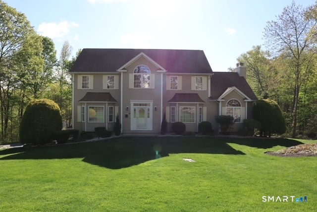 51 Brookfield Road Seymour, CT 06483 - Photo 2 of 37 a front view of a house with yard and green space