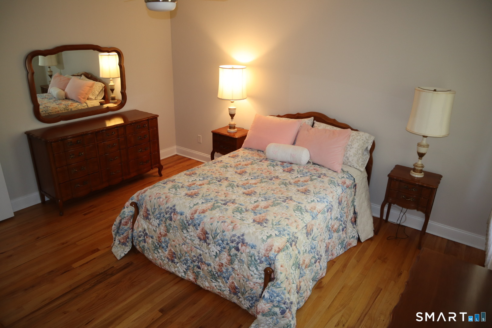 51 Brookfield Road Seymour, CT 06483 - Photo 29 of 37 a bedroom with a bed and wooden floor