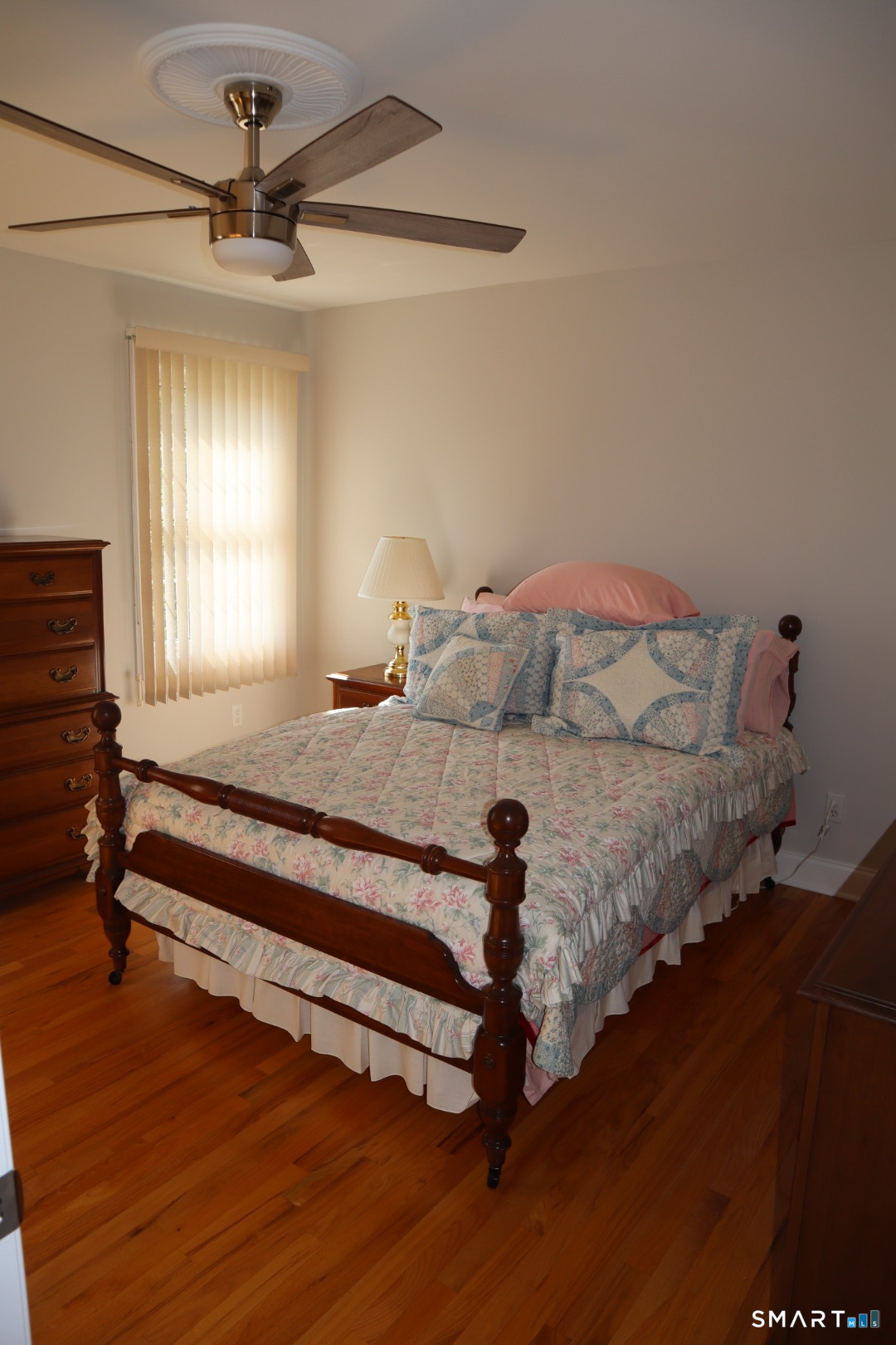 51 Brookfield Road Seymour, CT 06483 - Photo 30 of 37 a bedroom with a bed and a chandelier