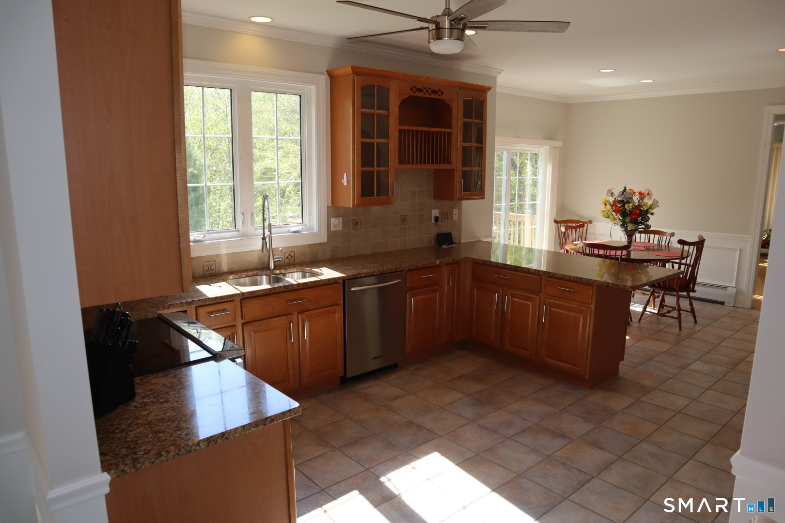51 Brookfield Road Seymour, CT 06483 - Photo 10 of 37 a kitchen with stainless steel appliances granite countertop a sink wooden cabinets and a granite counter tops