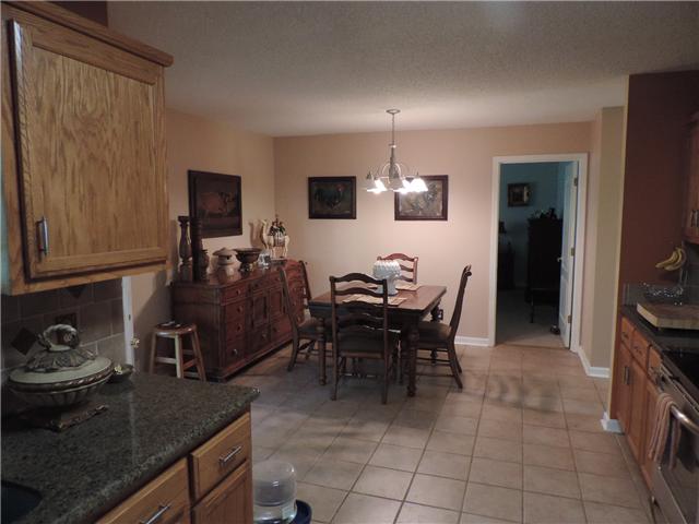 3480 Trough Springs Road Adams, TN 37010 - Photo 11 of 17 Large dining area adjacent to kitchen.