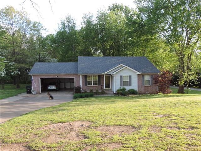 3480 Trough Springs Road Adams, TN 37010 - Photo 2 of 17 Large 2 car garage (laundry located in garage); Extra wide concrete driveway with sidewalk to front and back of home.