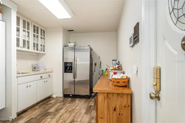 a utility room with closet dryer and washer