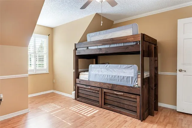 a room with a bed and a window