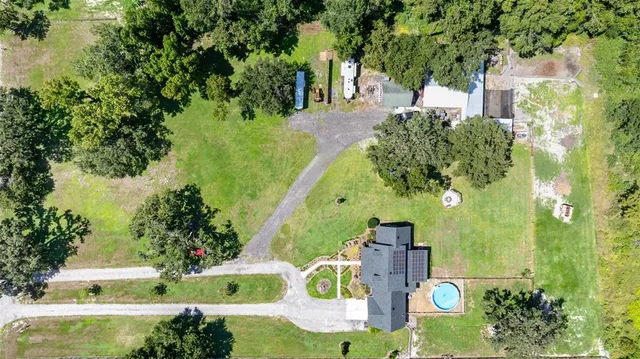 a view of statue in a garden