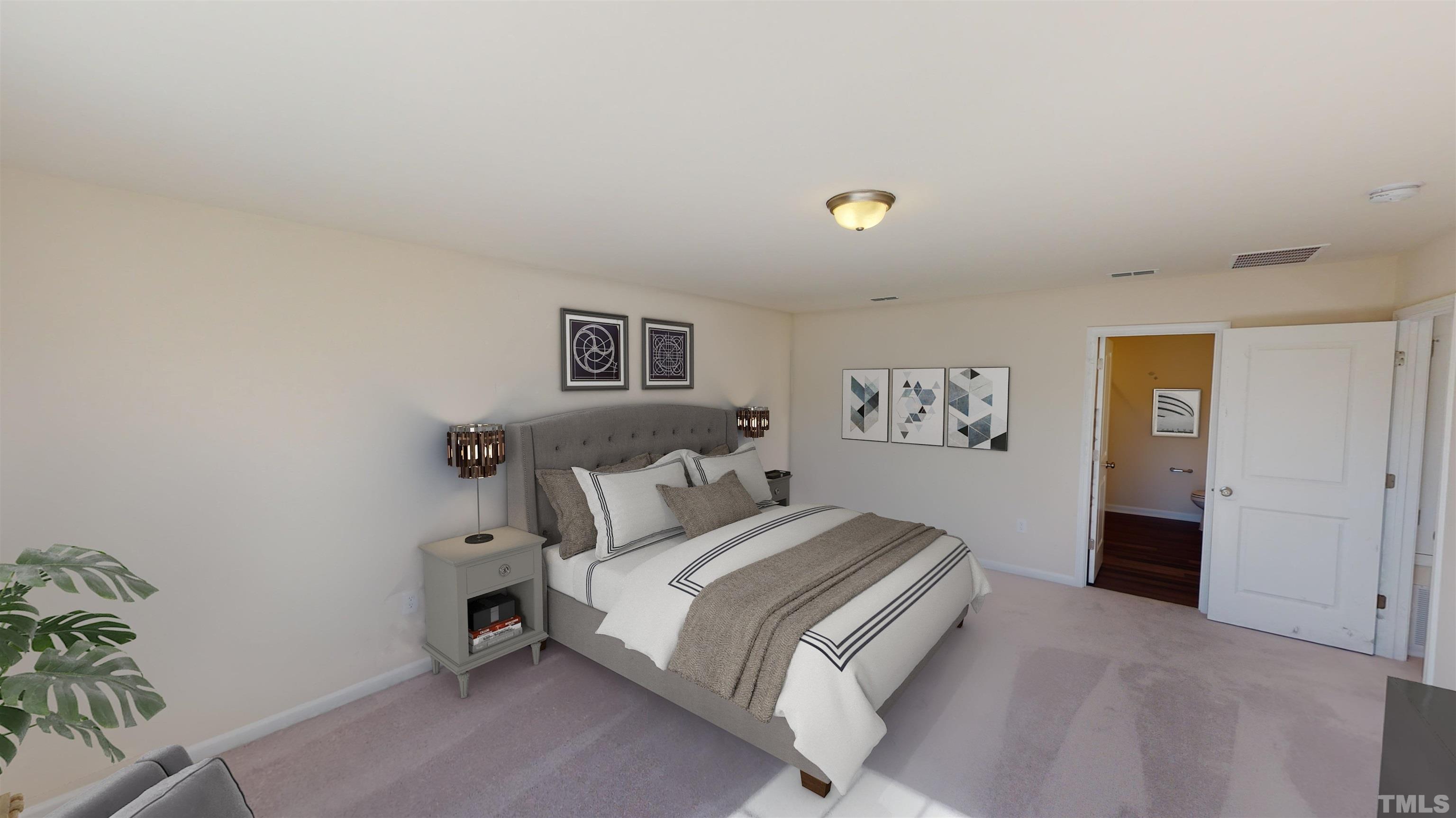 1505 Justice Union Court Raleigh, NC 27604 - Photo 2 of 22 a bedroom with a bed and painting on the wall