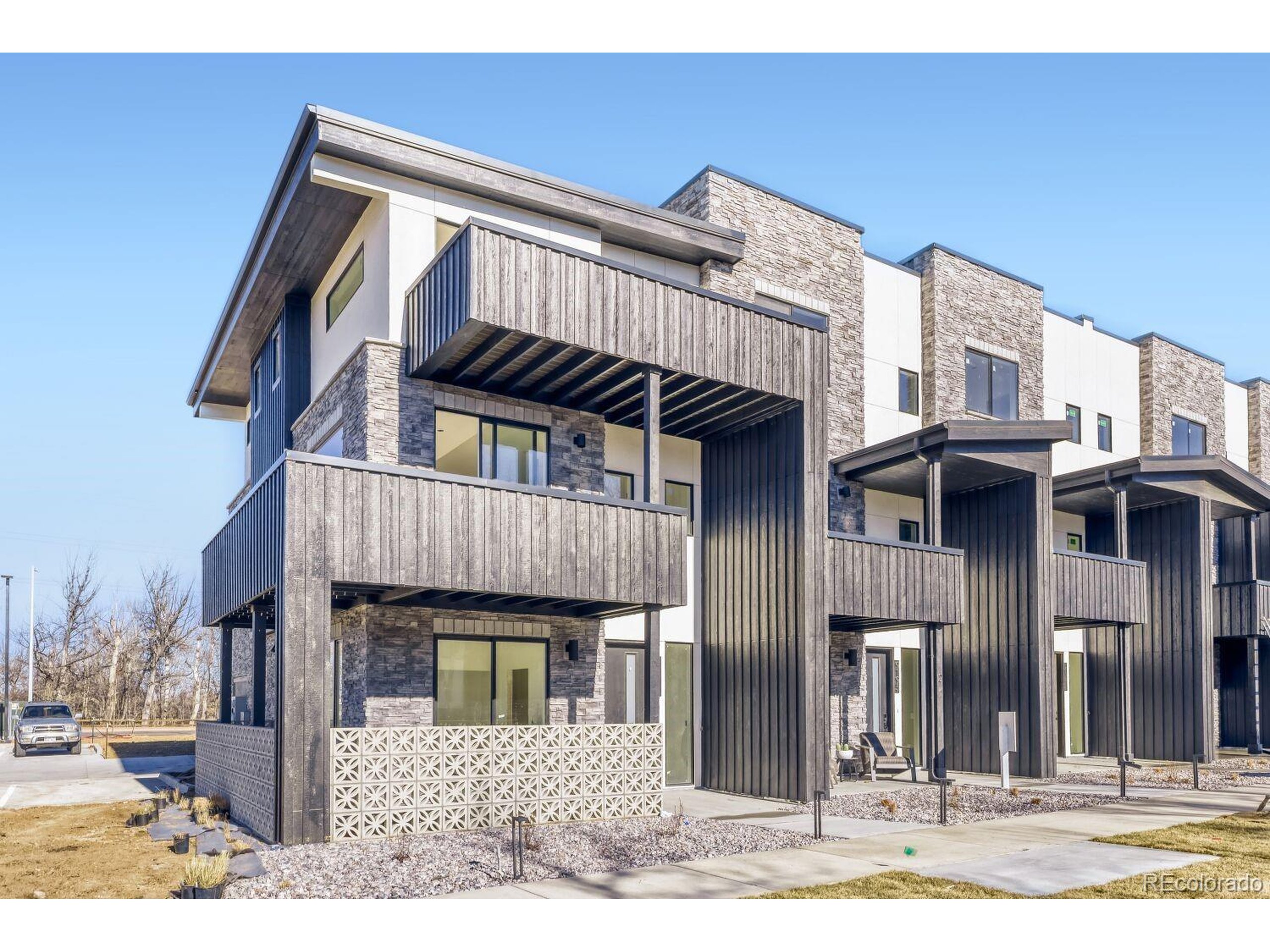9195 Pierce Street, Unit 1 Westminster, CO 80021 - Photo 1 of 25 a view of a house with a balcony