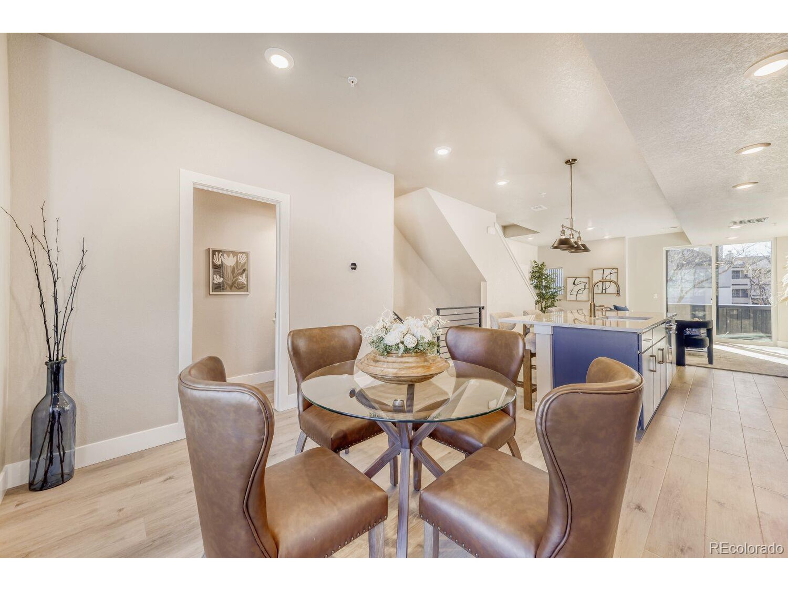 9195 Pierce Street, Unit 1 Westminster, CO 80021 - Photo 7 of 25 a view of a dining room with furniture