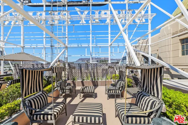 a view of a table and chairs in patio