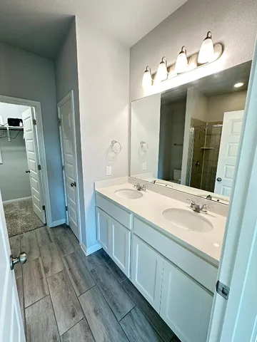 a bathroom with a shower and toilet