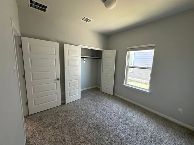 a view of livingroom with furniture and staircase