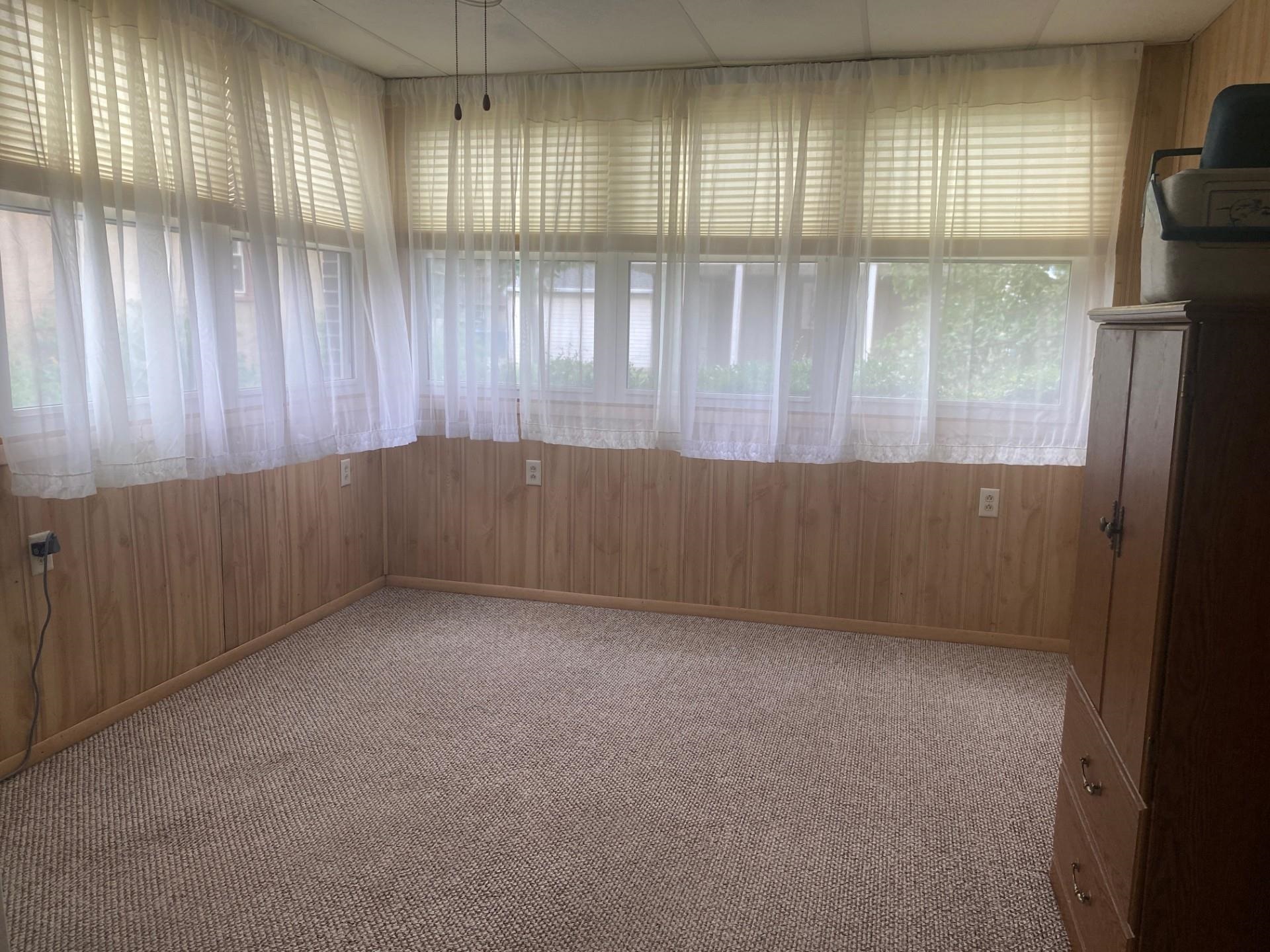 715 West Cleveland Street Spring Valley, IL 61362 - Photo 6 of 15 a view of an empty room with a window