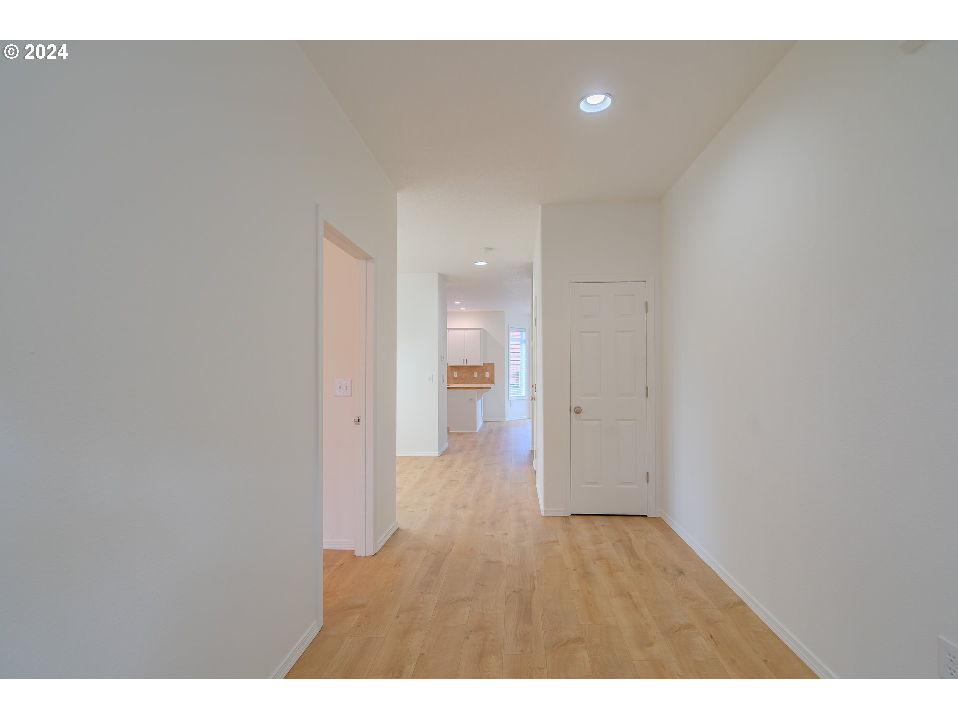 314 South 34th Place Ridgefield, WA 98642 - Photo 2 of 48 a view of an empty room and wooden floor