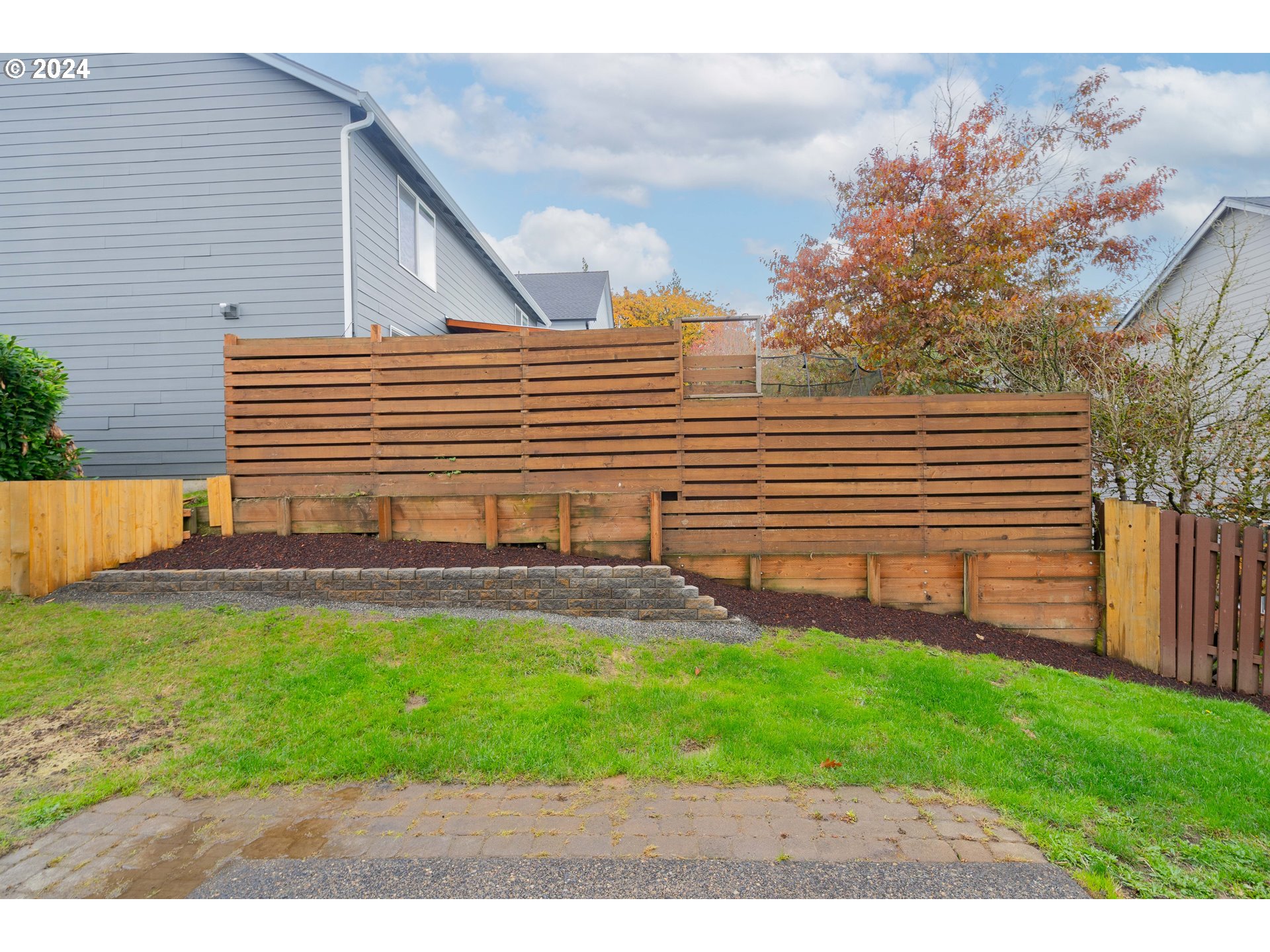 314 South 34th Place Ridgefield, WA 98642 - Photo 45 of 48 a view of a backyard with a garden