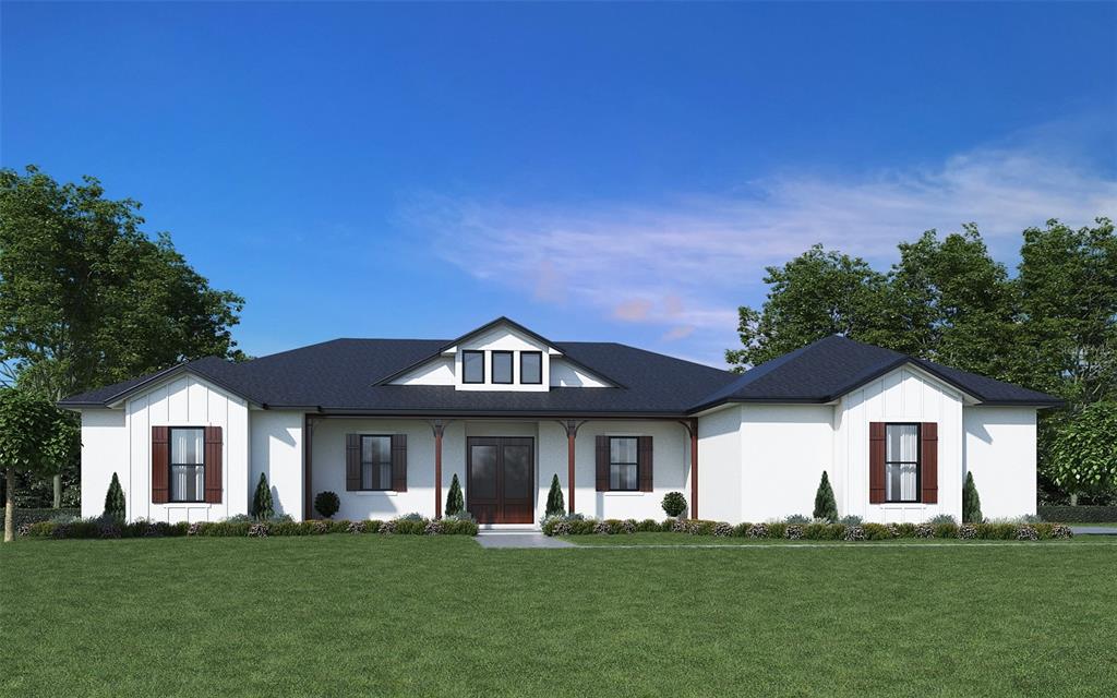 3412 Lake Diane Road Tavares, FL 32778 - Photo 2 of 16 a front view of a house with a yard