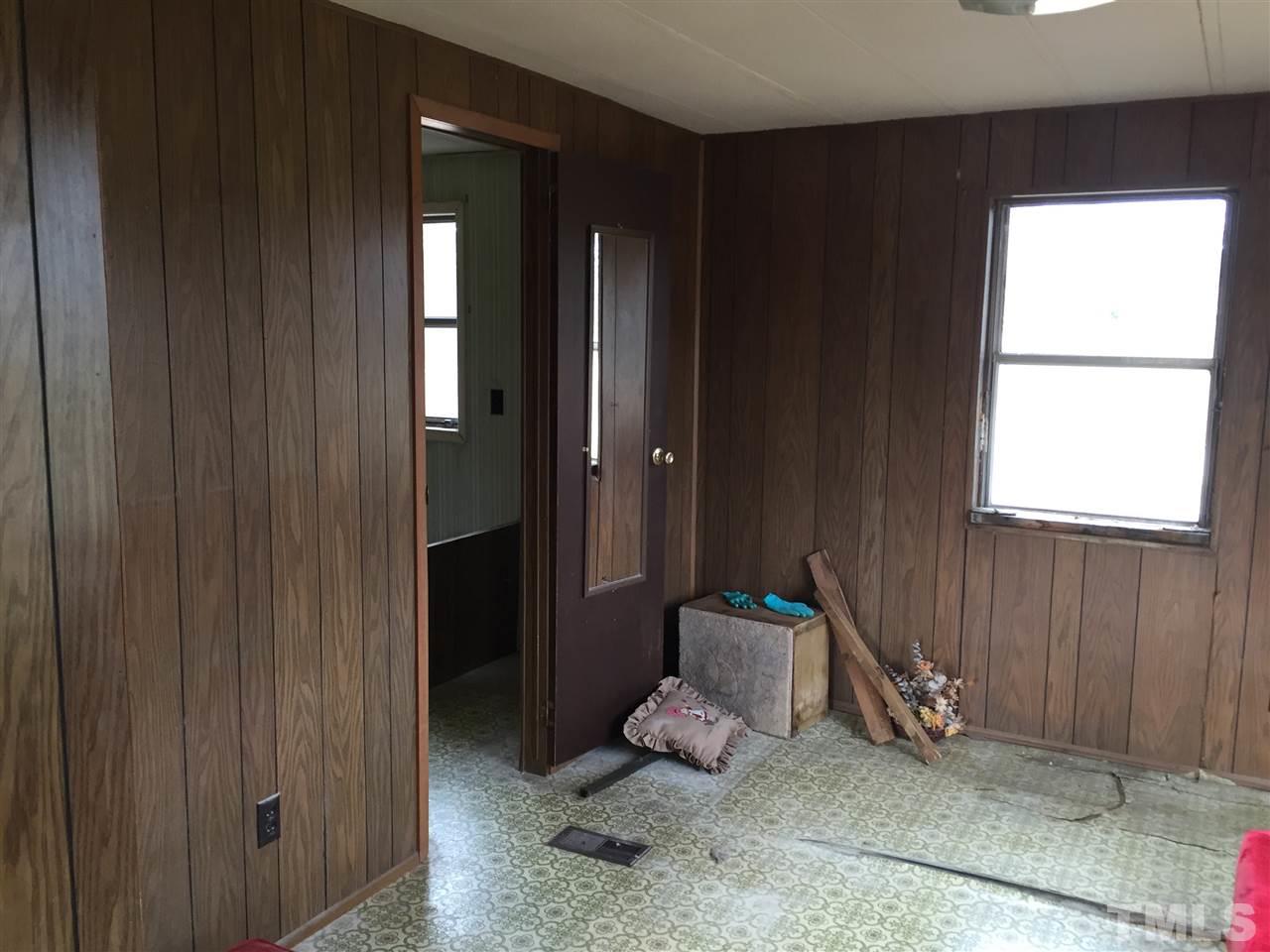 1806 Whitt Town Road Roxboro, NC 27574 - Photo 11 of 11 a room with furniture and window