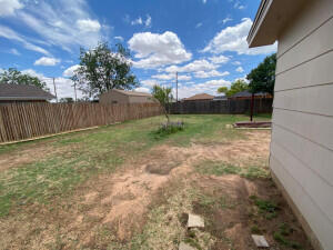 917 Adrian Street Lubbock, TX 79403 - Photo 12 of 13 a view of a backyard