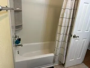 a bathroom with a bathtub