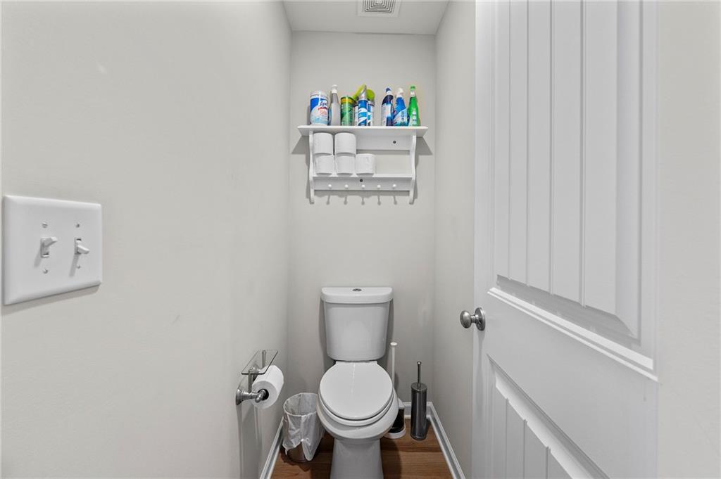 230 Augusta Walk Canton, GA 30114 - Photo 33 of 56 a bathroom with a toilet and a sink