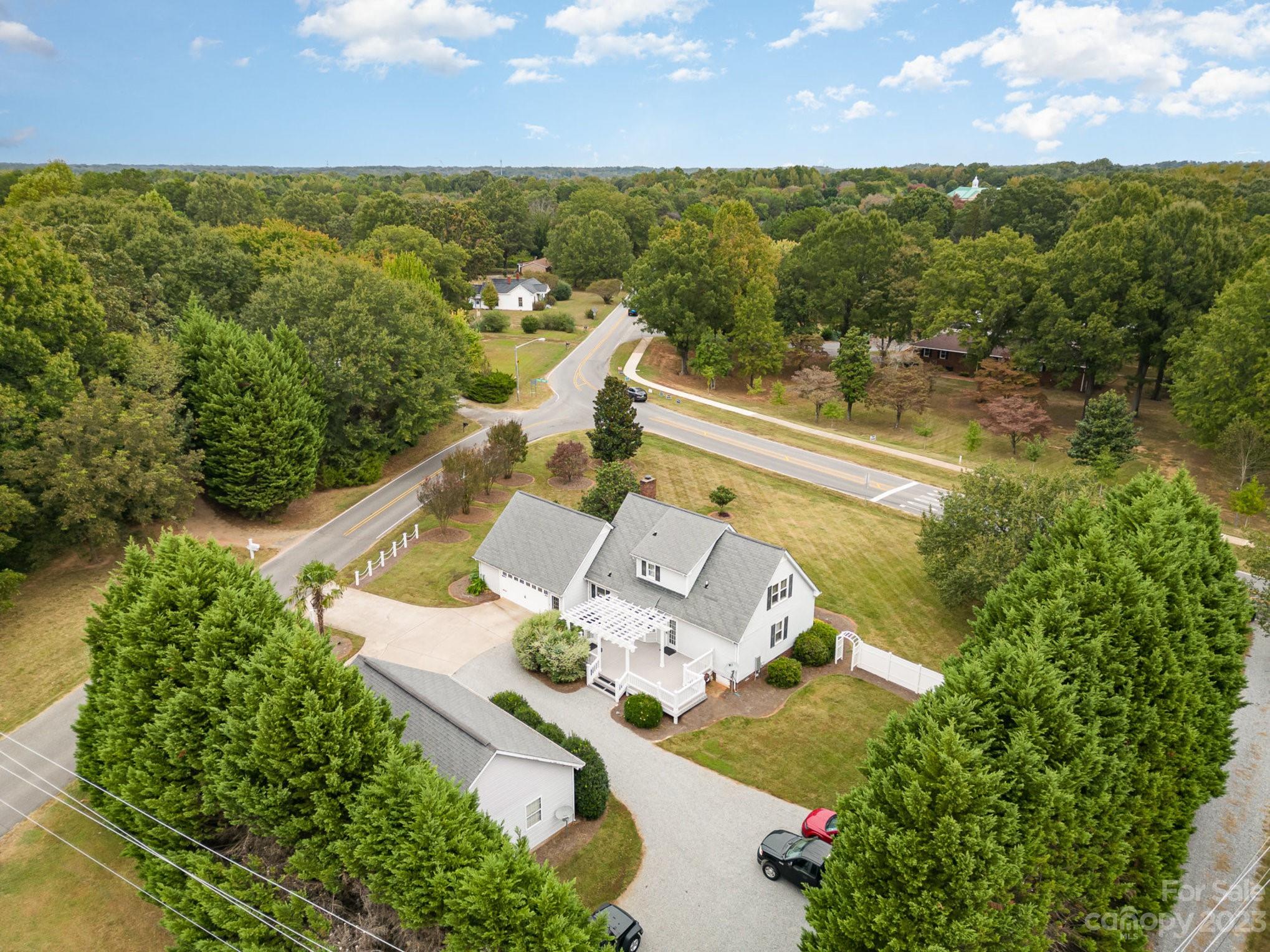 15531 Stumptown Road Huntersville, NC 28078 - Photo 1 of 35 an aerial view of residential houses with outdoor space