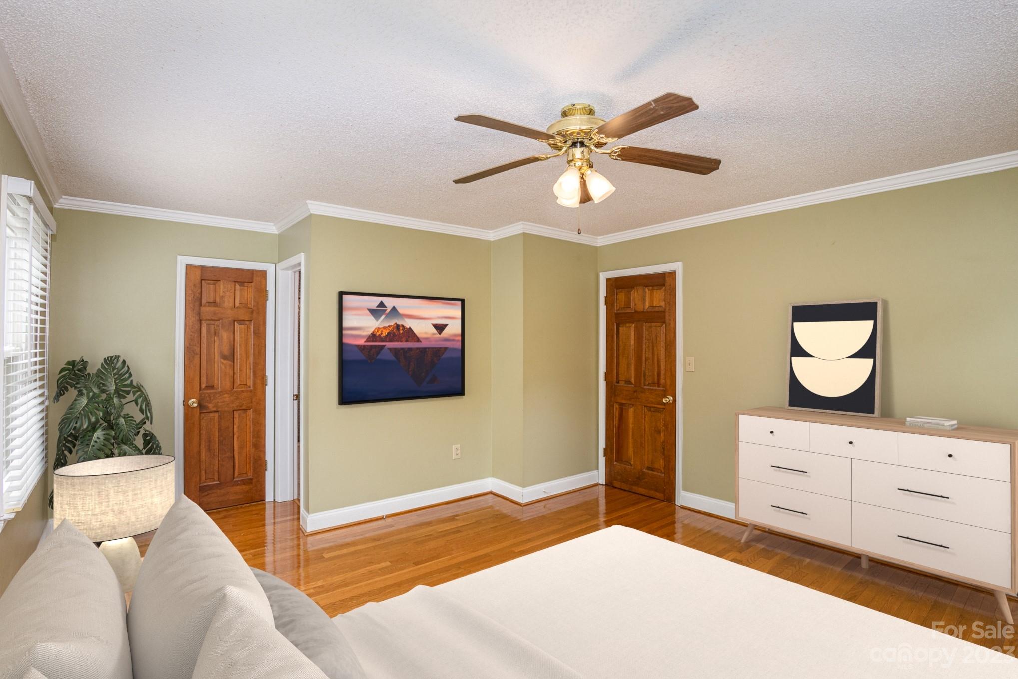 15531 Stumptown Road Huntersville, NC 28078 - Photo 21 of 35 a bedroom with a bed and a painting on the wall