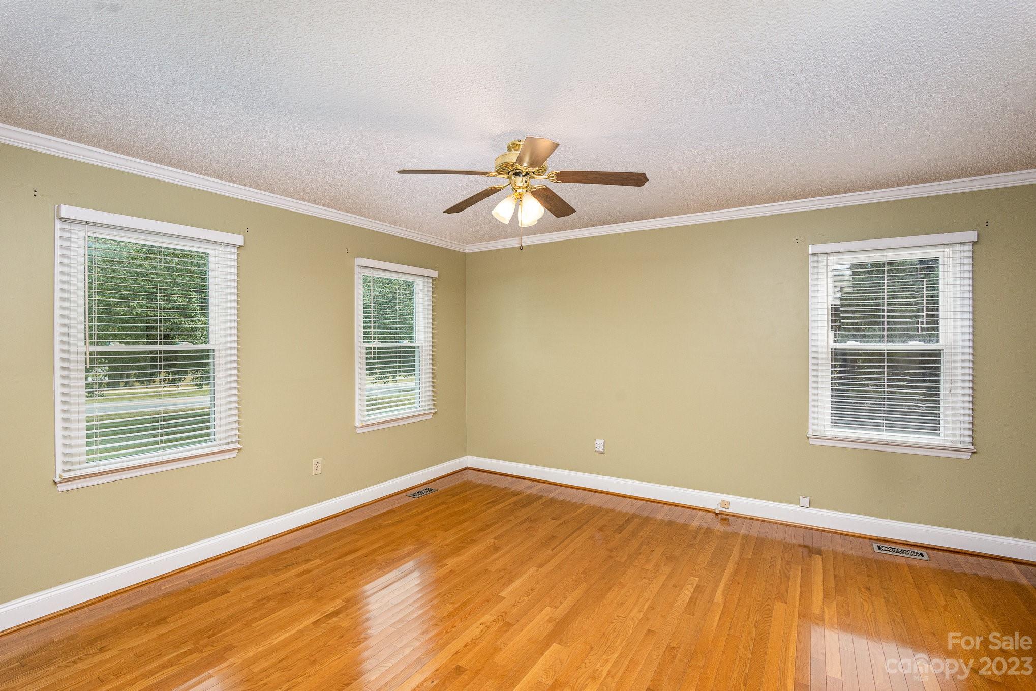 15531 Stumptown Road Huntersville, NC 28078 - Photo 24 of 35 a view of a room with a wooden floor and a window